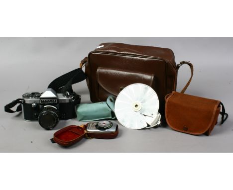 A small collection of photographic equipment including a 35mm SLR Prakica Super TL, Kodak Brownie 127, cased West flash, ligh