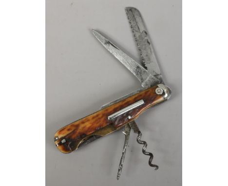 A Victorian nine piece multi tool folding pocket knife with stag antler scales by Mappin & Webb of Sheffield.