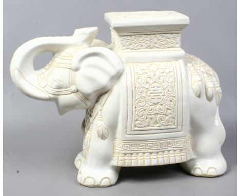 A pottery garden seat formed as an Indian elephant.