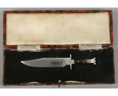 A cased miniature bowie knife with horn scales the blade stamped R. R. Middleton.