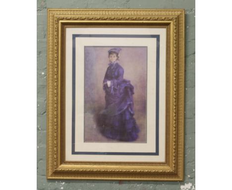 A large gilt framed print portrait of a young lady.