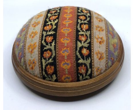 A mid 20th century tapestry stool, on bun feet 10cm x 26cm&nbsp;