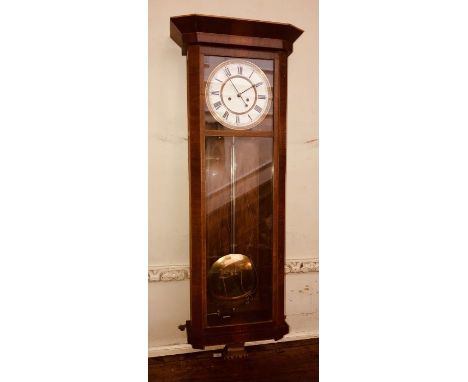 A 19th Century mahogany and satinwood strung Vienna wall clock, attributed to&nbsp;Austrian Dachluhr moulded cornice, above r