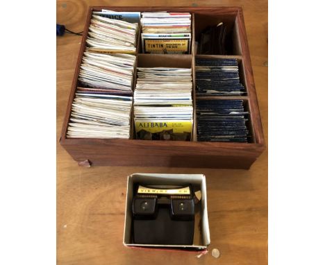 Two view-masters, one a battery powered light master together with a large number of view-master reels in a fitted box (qty)