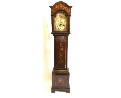 An Edwardian mahogany chiming longcase clock, domed hood with boxwood marquetry, the dial with Tempus Sugit above the dial, b
