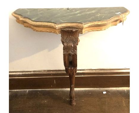 A 19th century giltwood serpentine fronted console table with faux painted marble top, raised on a singular foliate scrolled 
