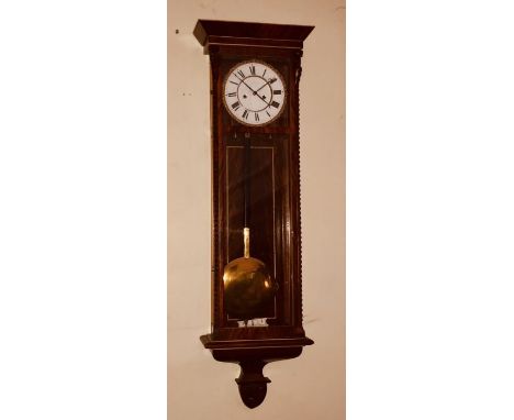 A 19th century mahogany and satinwood strung Vienna wall, in a Austrian Dachluhr influence, out swept cornice above a rectang
