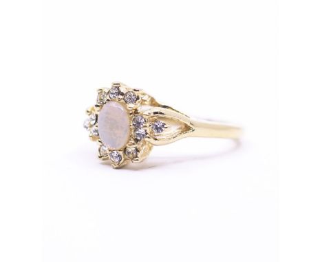 A Monica Cavinader opal ring in box.&nbsp;