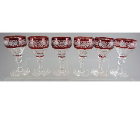 A set of six liqueur glasses, Nachtmann Traube ruby flash with floral decoration. 9 cm tall. (6)Condition: in good condition.