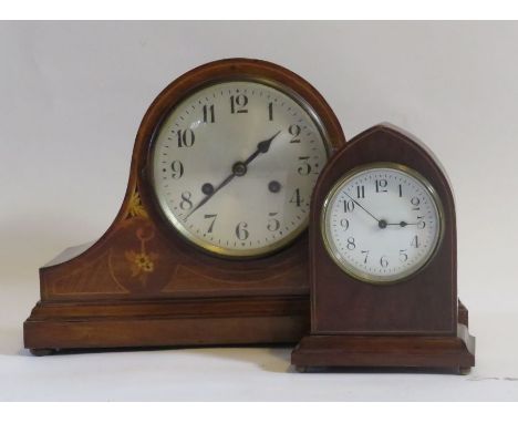 An early 20th century mantel clock with floral inlaid decoration, 25cm high and a French mantel clock in lancet shaped case (