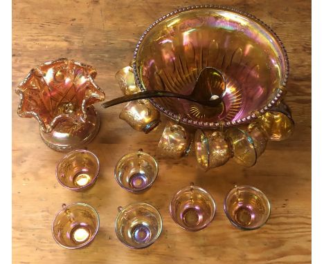 An imperial glass punch bowl (31cm diameter), together with 12 glass cups and plastic s-shape hangers, together with a imperi