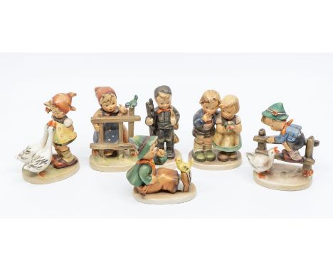 A group of various polychrome W. Goebel German figures including girl at the fence, girl with wild geese, chimney sweep, all 