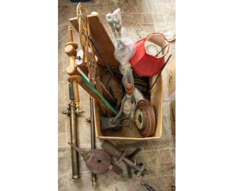 A box of vintage household equipment to include: brass lamp, brass bed warmer, ladle fire irons, garden sprayer, Ewbank mince