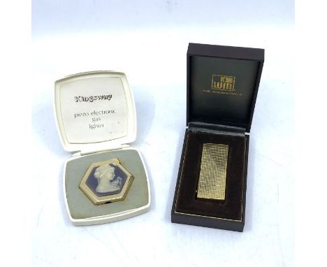 A boxed Win International cigarette lighter and a cased Kingsway piezo gas lighter. (2)