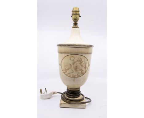 A tole peinte lamp base urn shaped, on a square base, wired for electricity 39cm high