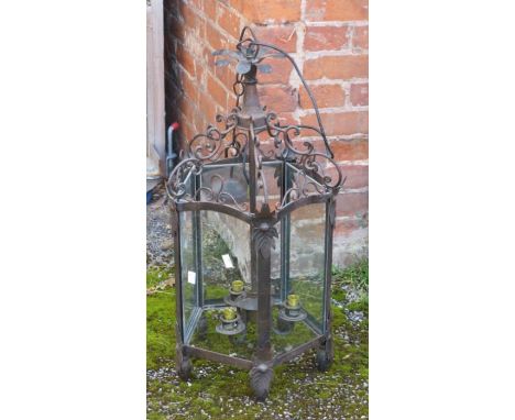 A cast iron lantern with 3 electrical fittings and glazed side panels (af)
