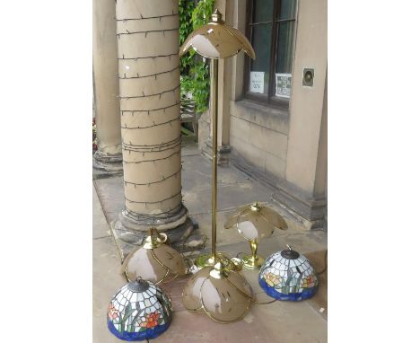 A pair of tiffany style lamps and a further 4 lamps come on a brass standThese lots have been donated by Rotary District 1210