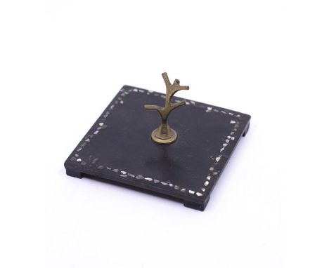 An early to mid 20th century japanned mother of pearl decorated ring stand, brass branches supported on a square base 8cm x 8