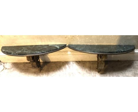 A pair of 19th century giltmetal acanthus leaf console tables with green marble tops 63cm W x 22cm D