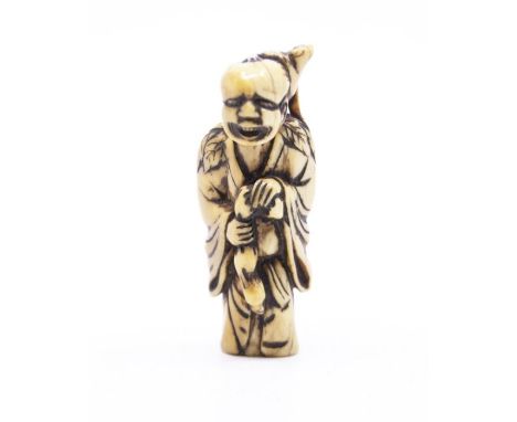 A nineteenth century carved antler netsuke representing Gama Sennin. 6cm tall.&nbsp;