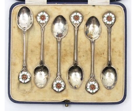 A set of six cased George V silver and enamel tea spoons, enamelled Tudor Rose, Birmingham 1932 by Mappin &amp; Webb