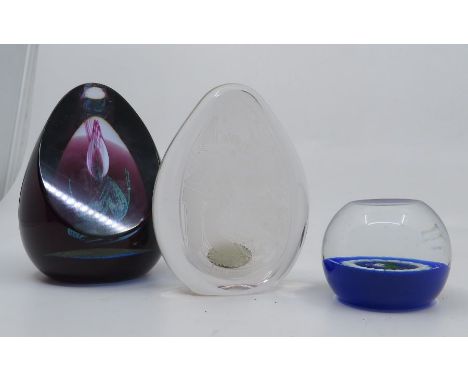 Two marked Caithness paperweights and a similar Wedgwood example. (3)