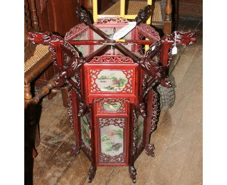 A modern Chinese hexagonal pierced wood and painted hanging lantern, 76cm high x 74cm wide&nbsp; (1)