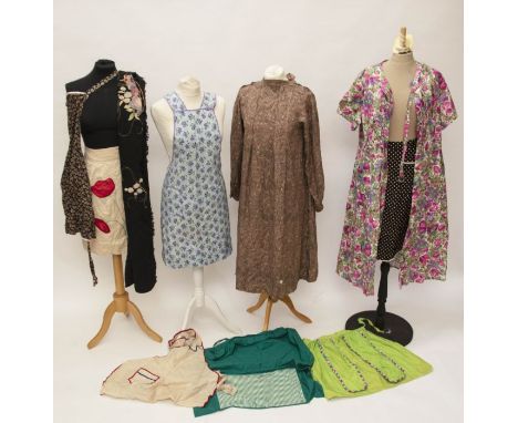 A vintage aprons and pinnies including queen’s coronation, paisley print house coat, 1950s day dress or house coat, embroider