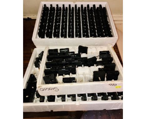 A quantity of 20th century clock battery packs. Approximately 318.