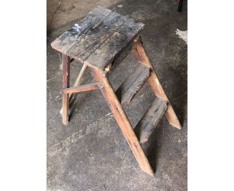 A late 19th century wooden step ladder, with two reeded steps 55.5cm H x 30.5cm W x 53cm D (when opened)