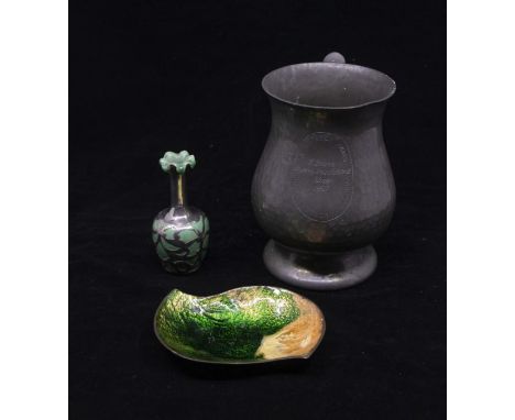 A small ceramic vase with silver overlay, Birmingham 1952, together with a pewter tankard awarded for Livestock Husbandry, Ru