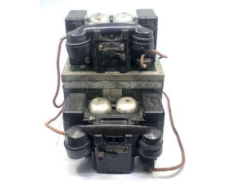 Two early 20th century British military field telephones, both stamped 'Telephone Set 'F' Mk II L.R.', one in a fitted period
