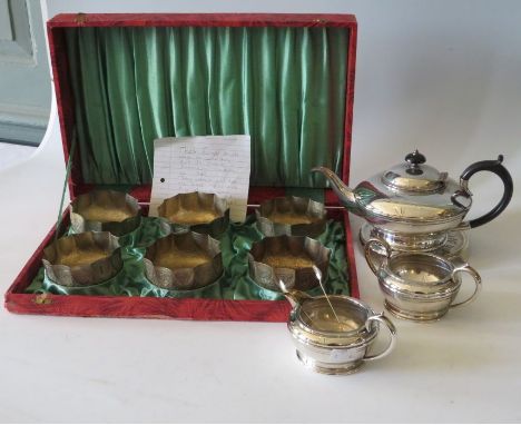 A three piece civic EPBM tea set EPNS sugar tongue and a caged set of 6 1945 Indian plated brass finger bowlsThese lots have 