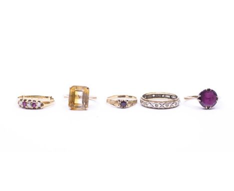 Two garnet rings, a ruby and diamond ring and two other rings (5)