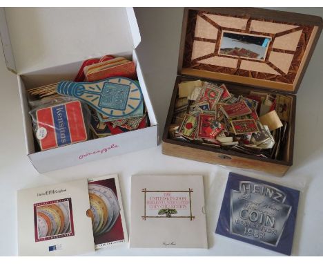 A box of vintage matchbox labels, a box of bear mats and a three set of proof decimal coinsThese lots have been donated by Ro
