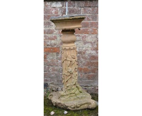 A concrete sundial with metal top. 85 cm tall.&nbsp;