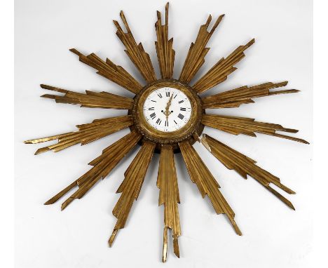 
	
		A 19th Century French giltwood wall clock, the 8.25" white enamel dial supporting an eight day striking movement within 