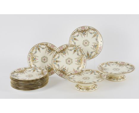 
	
		An early 20th Century Minton part dessert service, with raised gilt scrolling foliage and coloured enamel pendant flower