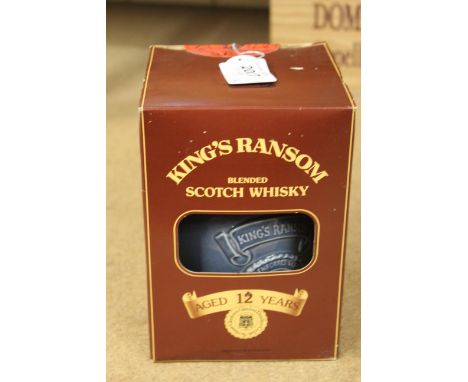 A boxed ceramic decanter of King's Ransom Scotch whisky