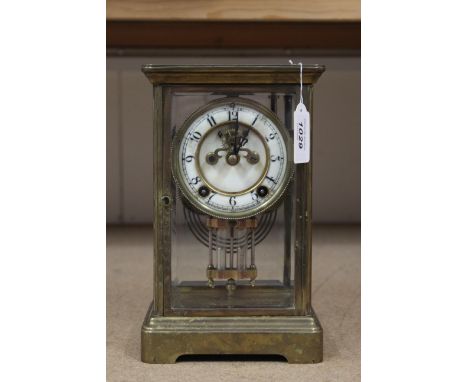 An early 20th Century brass cased crystal regulator mantel clock made by The New Haven Clock Company, Conn. USA, 10" high wit