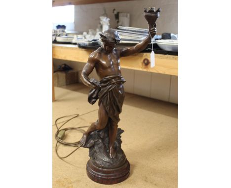 A large bronzed spelter figure table lamp on red stone base, marked "Excelsior" to the base and bearing signature E. Picault 