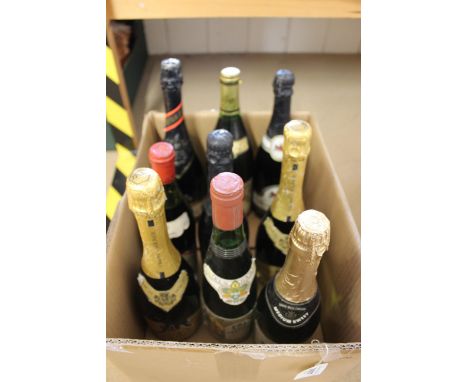 Nine bottles of mixed wine including three German white, two French white, two French red, a Norfolk white and a sparkling Br