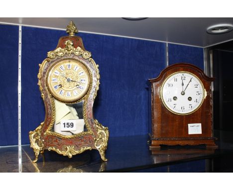 A Boulle style tortoiseshell and brass marquetry mantel clock, 29cm high and a mahogany cased mantel clock (2)