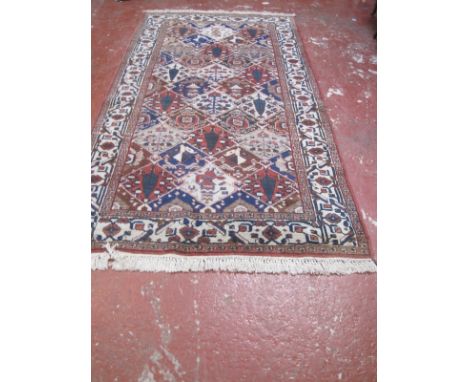 A Bakhtiar carpet 310 x 160cm 