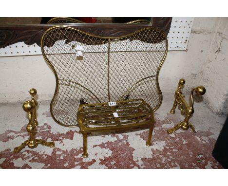 A brass mesh firescreen and a George II style walnut wall mirror, brass trivet and pair of andirons  Best Bid