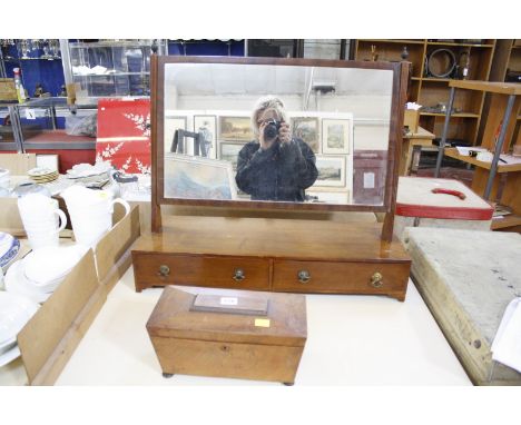 A 19th Century mahogany toilet mirror, the base with two drawers and a tea caddy (2)
