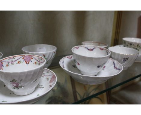 Twelve assorted tea bowls, to include a Worcester blue and white 'Mansfield' pattern tea bowl with blue crescent mark, anothe