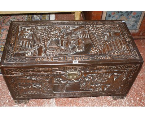 A Chinese carved hardwood trunk