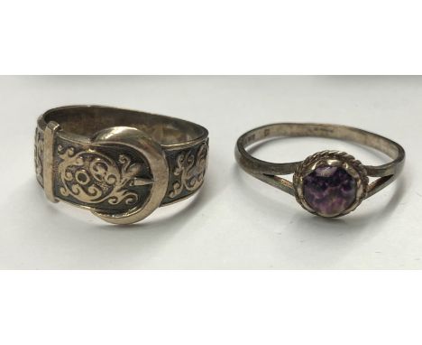 BOXED SILVER BUCKLE RING AND A BOXED SILVER AND BLUE JOHN RING