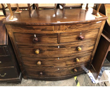 REGENCY MAHOGANY CROSS BANDED AND INLAID BOW FRONT CHEST OF TWO OVER THREE DRAWERS 